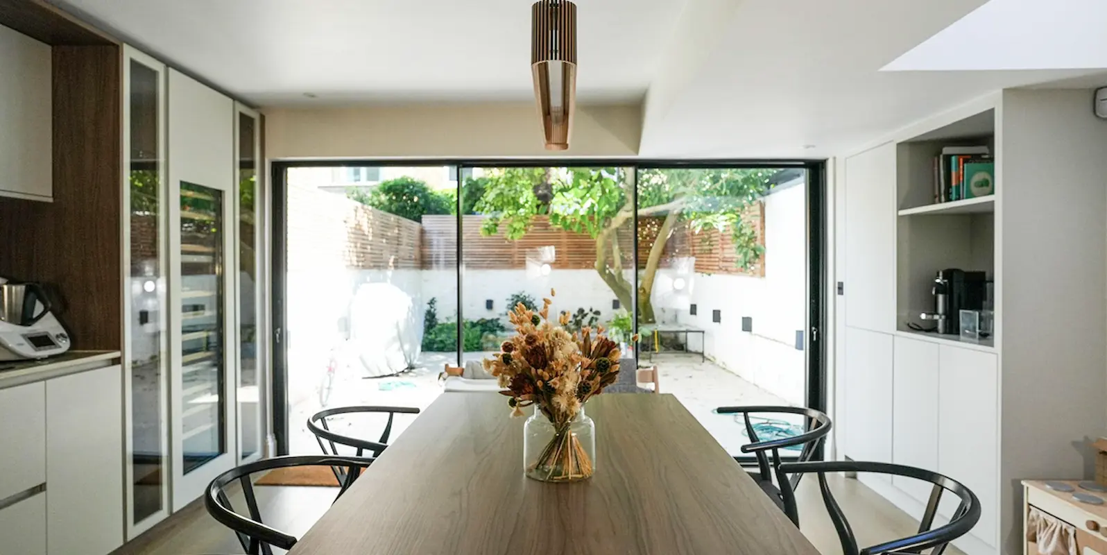 Victorian house refurbishment in Fulham with dining room and garden access.
