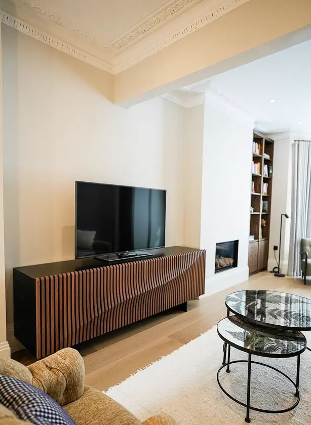 Victorian house refurbishment in Fulham with decorative cornicing and TV cabinet.