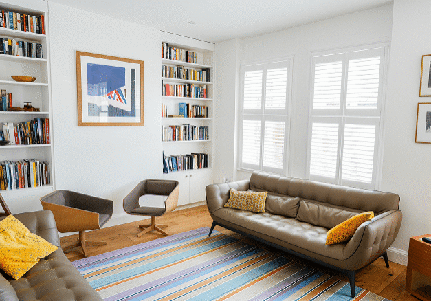 Apartment renovation London living room with upgraded finishes inside a period property.