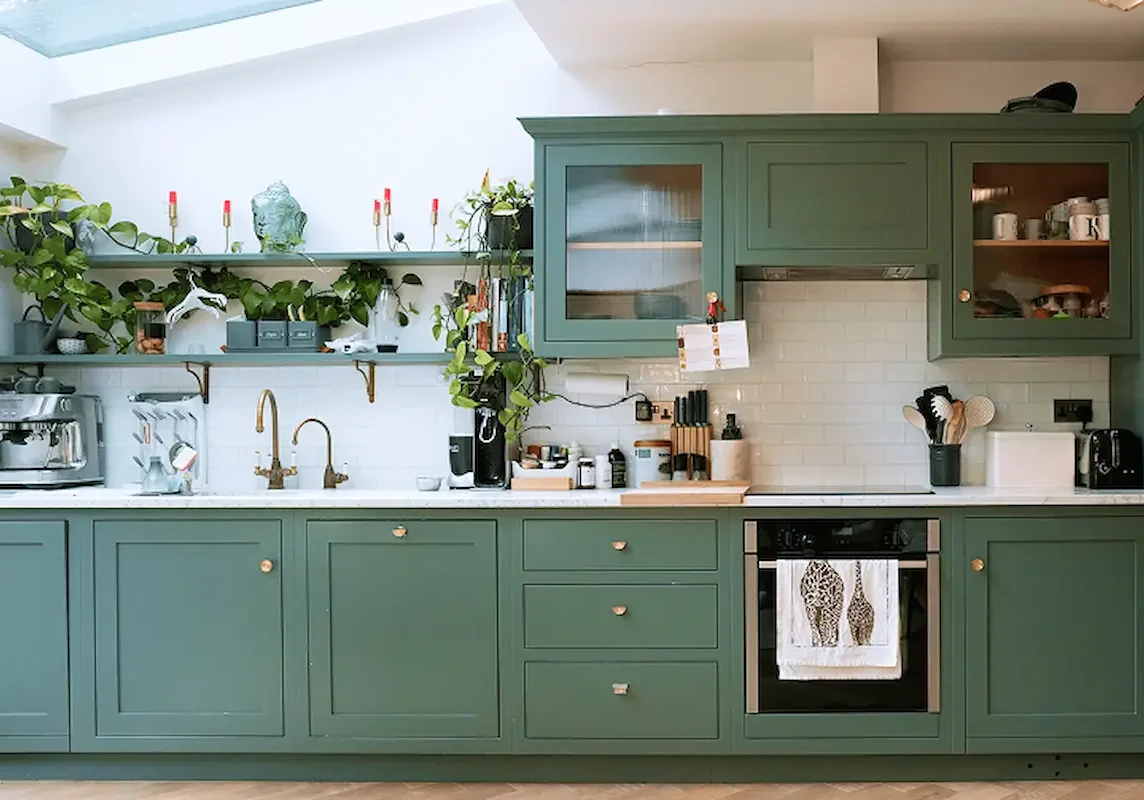 Terrace house renovation in Chelsea with bespoke shaker kitchen and skylight.