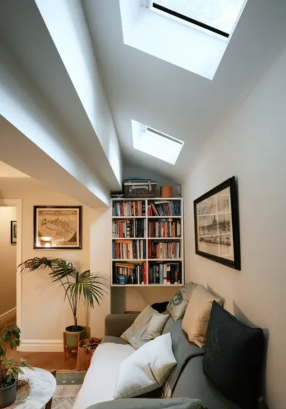 Terrace house renovation in Chelsea with bespoke shaker kitchen and skylight.