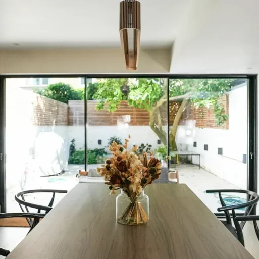 Victorian house refurbishment in Fulham with dining room and garden access.