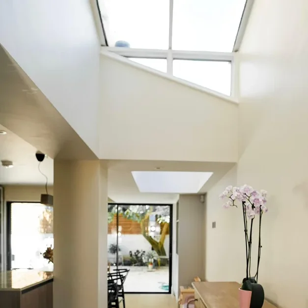 Victorian house refurbishment in Fulham with hallway skylight and bespoke joinery.