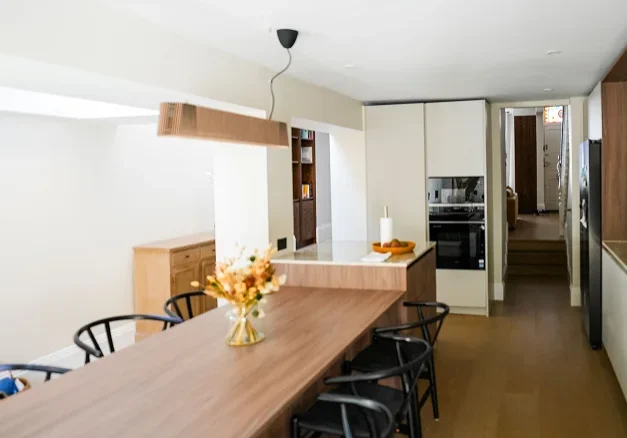Victorian house refurbishment in Fulham with open kitchen and timber island.