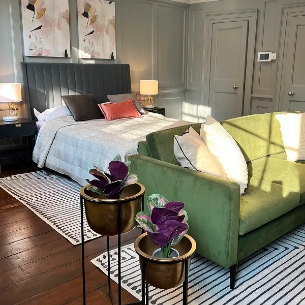 High-end London home renovation bedroom completed by trusted builders, showcasing bespoke design and quality craftsmanship.